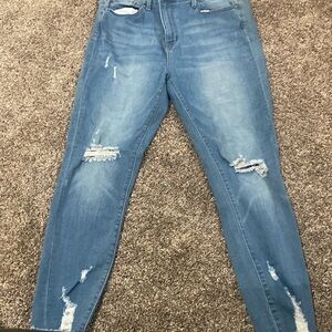 Woman’s ripped skinny jeans